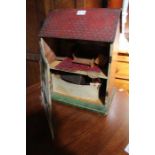 A mid century small sized dolls house including contents