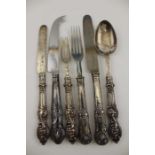 A small selection of silver handled flatware