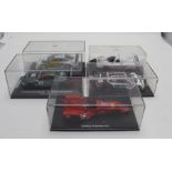 A set of 5 model racing cars to include a Paul Di Resta , A Silverstone 2005 winning Aston Martin DB