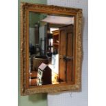 A gilt framed bevel plate wall mirror