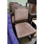 An oak set of six dining chairs with brown velour back and seat pad with decorative stud work on wel