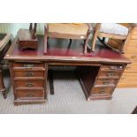 A late 19th century mahogany twin pedestal desk