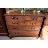A Georgian mahogany five drawer chest with unusual double handles
