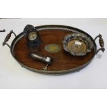 An oval oak tray with silver plated gallery, a bottle coaster, ham bone handle