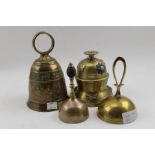 Four brass bells, one with stand