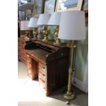 A collection of four brass table lamps and a standard lamp (5)