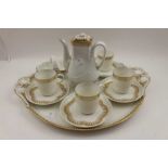 Limoges cabinet set, gilded white porcelain, comprising; tray, coffee pot, four cups & saucers,