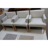 Four cream leather upholstered chairs