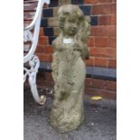 A reconstituted stone cherub