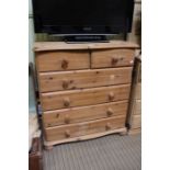 A pine six drawer chest