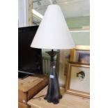 A single modernist table lamp