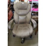 An office swivel chair in neutral suede effect upholstery