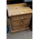 A small pine three drawer chest, together with a two door low cupboard