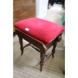 A late 19th / early 20th century rosewood based rectangular pad topped piano stool