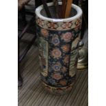 A ceramic stick stand & sticks