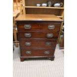 A small Georgian design four drawer chest , the front being a single cupboard door