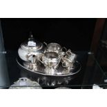 Silver plated teaset with scuttle together with an oval tray