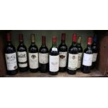 A shelf containing 10 bottles of various Bordeaux various wines to include vintage examples