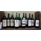 A shelf containing 10 bottles of various Bordeaux various wines to include vintage examples
