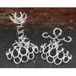 A quantity of garden items, created from welded horseshoes