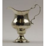 Thomas Shepherd, a George II silver cream jug, London 1758, 93g