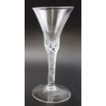 An 18th century mercury air twist stem wine glass, with flared plain bowl, raised on a circular coni