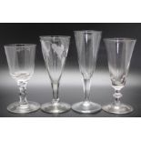 A collection of four ale glasses to include an 18th century with hops and barley c.1780,