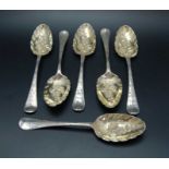 Ebenezer Coker, a set of six George II berry spoons, Victorian embossed, London 1746, 420g