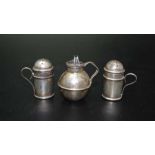 S.Blanckensee & Sons Ltd. A pair of miniature silver cylindrical kitchen peppers, with handles