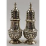 Sibray, Hall & Co. A pair of Victorian silver pepper pots