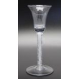 An 18th century opaque twist glass,single stem opaque twist with central cable bell bowl Circa 1760