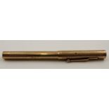 A 9ct gold fountain pen engraved to the barrel, "Theatre Royal Staff" monogrammed "PR"