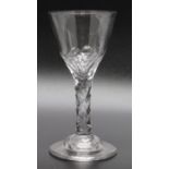 An 18th century facet stem glass, domed foot circa 1790