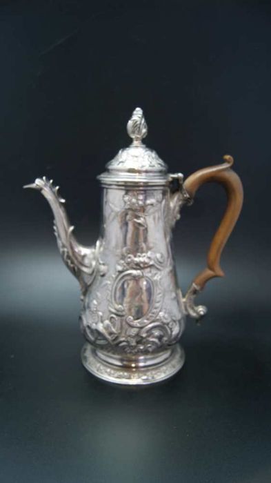 Jacob Marsh, an early George III silver coffee pot, embossed decoration,