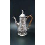 Jacob Marsh, an early George III silver coffee pot, embossed decoration,