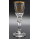 An 18th century Continental gilded liquor glass