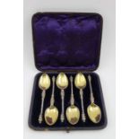 Henry Holland, A cased set of six silver gilt apostle teaspoons, London 1872, 97g