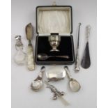 Sanders & Mackenzie, an Art Deco silver egg cup & spoon set, engine turned decoration