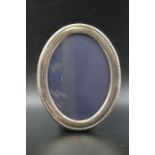 Carrs of Sheffield Ltd. An oval silver mounted photograph frame