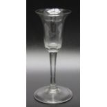 An 18th century plain stem glass, circa 1750 folded foot, partially polished