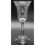 A late 18th century engraved wine plain stem glass, domed foot circa 1740