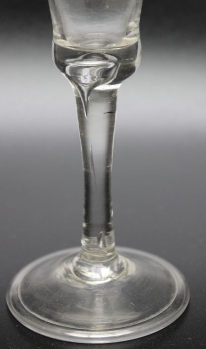 An 18th century bubble stem folded foot glass, circa 1740 - Image 2 of 3
