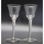 A pair of 18th century combined incised and air twist glasses circa 1750