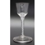An early 18th century opaque twist glass with folded foot circa 1755