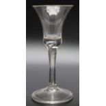 An 18th century bubble stem folded foot glass, circa 1740