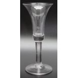 An 18th century plain stem glass, circa 1750