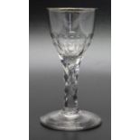 An 18th century facet stem glass with silver rim with central bubble in stem circa 1795