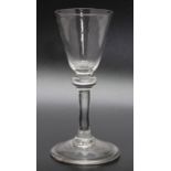 An early 18th century balustroid wine glass, circa 1740