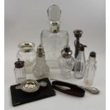 John Grinsell & Sons, a silver mounted glass spirit decanter of slab form, cut decoration