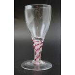 An 18th century cordial glass, with red and opaque twist stem, possibly Dutch c.1770